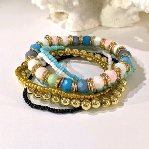 Seven layered blue and gold beaded bracelets